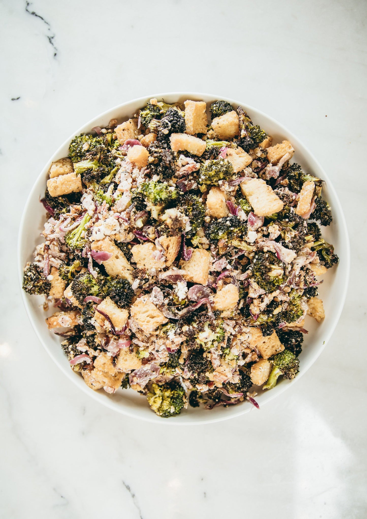 Roasted broccoli, crispy bacon, sourdough croutons, feta, almonds, lemon