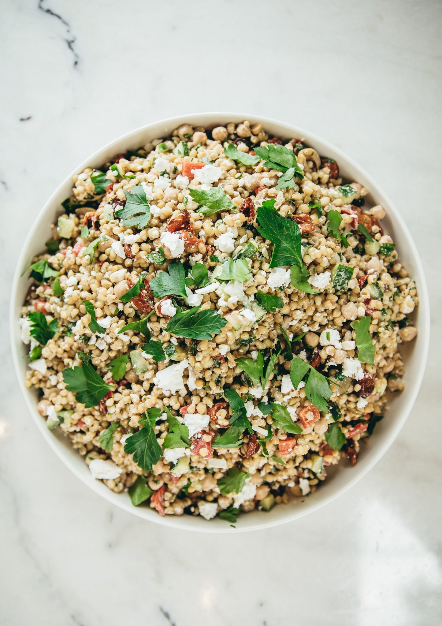 Mediterannean farro salad, slow roast tomatoes, cucumber, olives, feta, chickpeas, red wine vinaigrette