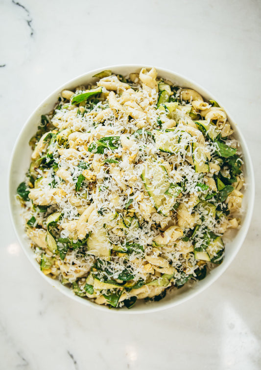 Zucchini ribbons, Casarecce, pesto, walnuts, spinach, charred corn, Parmigiana