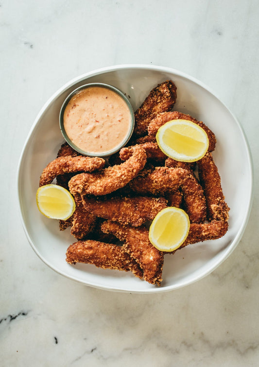 Chicken goujons, Parmigiana, honey mustard aioli