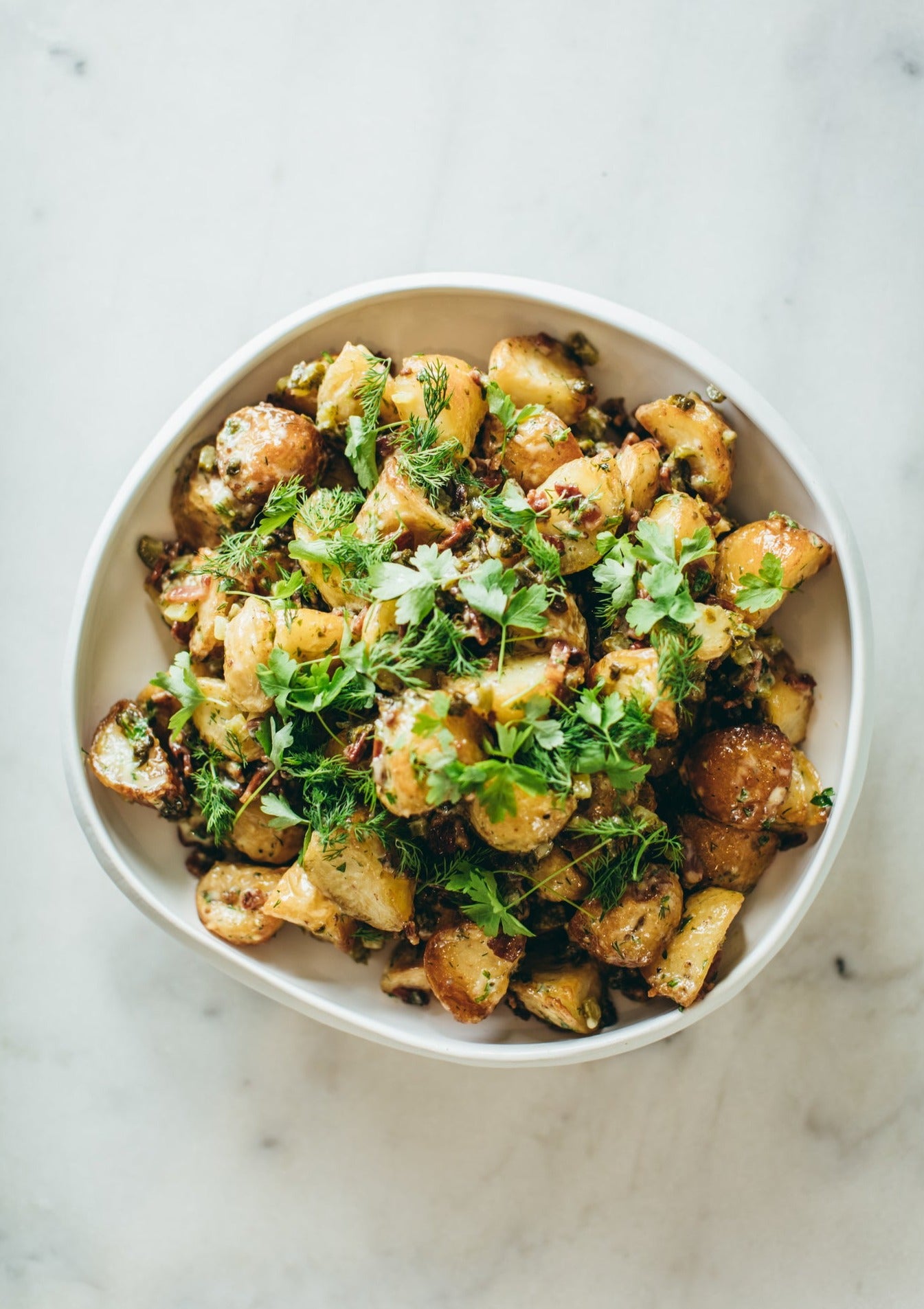 Roasted chats, honey mustard mayo, cornichons, capers, crispy bacon